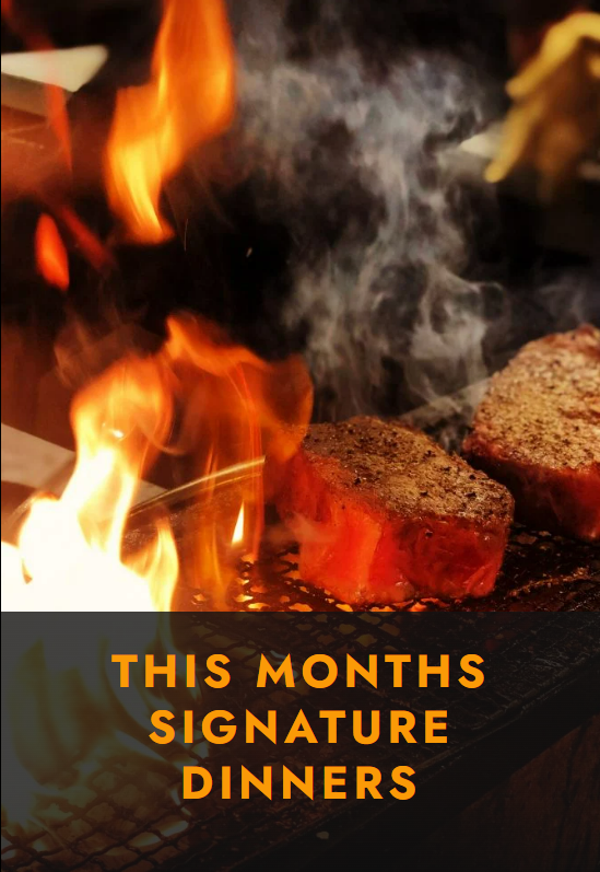 A sizzling steak grilling over an open flame with the text "This Month's Signature Dinners" in bold orange letters.